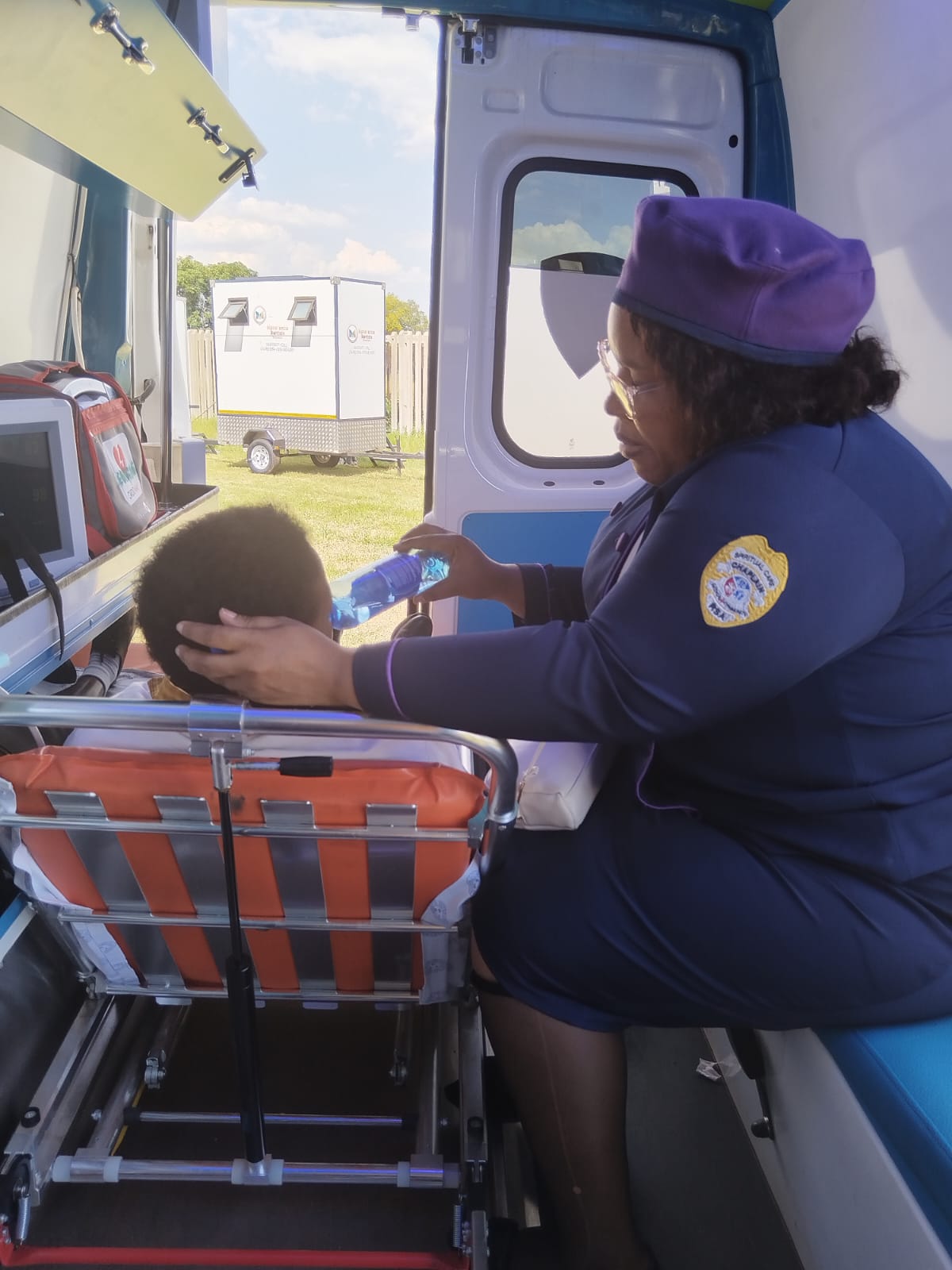 Hospital chaplain comforting a patient during a ward visit